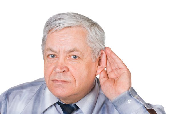 A person with hearing impairment signaling hard of hearing
