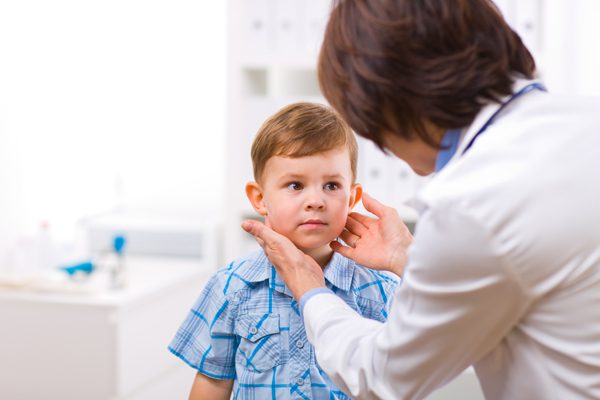 Child seeing a female audiologist 